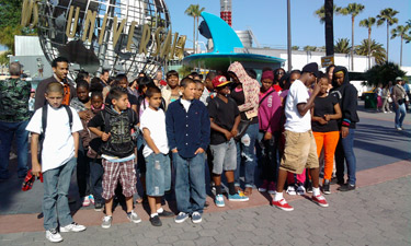 Los Angeles youth try new activites and broaden their circle of friends as part of the Watts Cluster Project.
