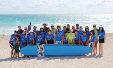 Kids with autism take advantage of an intriguing surfing camp in Miami Beach.