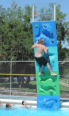 Pyramide USA's donation of an AquaClimb Poolside Climbing Wall at Fort Hood military base in Texas will help children and families living there develop confidence, self-reliance and self-esteem.