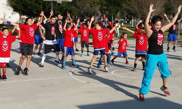 Youths participate in Troops for Fitness kickoff celebrations at Los Angeles' Sylmar Recreation Center. 