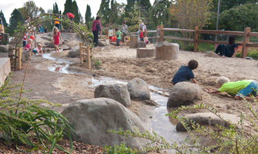 Sand and water at Portland's nature-themed Westmoreland Park provide hands-on, creative, imaginative and social play value.