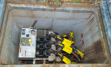 Here, Trident-S SafeVu switchgear has been installed in an underground vault, replacing the old oil-coated fuses. 
