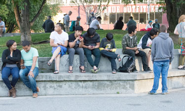 Pokémon Go players in an Anchorage, Alaska, park congregate and share stories.