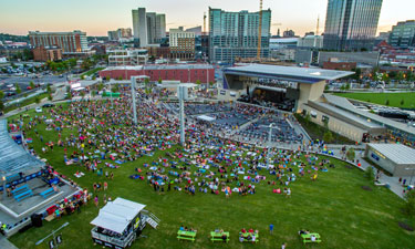 Nashville residents and visitors enjoy the outdoors and performances at the Ascend Amphitheater and on the 1.5-acre event lawn, the Green, in Riverfront Park on the banks of the Cumberland River.