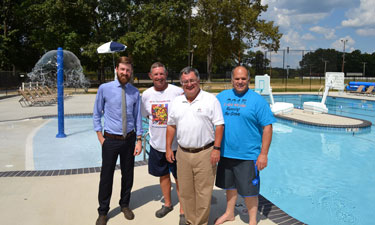 Loretto Pool project partners from left to right: Tom Doherty, TDEC; Gerald Parish, TDEC; Commissioner Robert J. Martineau Jr.; and Representative Barry Doss.