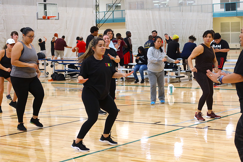 Participants get moving to the top Latin music hits during Zumba Fitness Night: Celebrating Latin Hits.