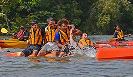 young adults kayak