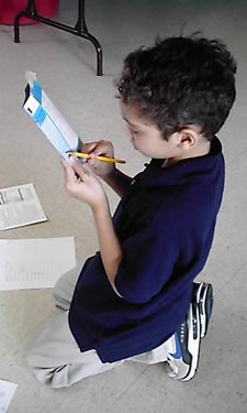 A Wise Kids participant practices reading food labels.