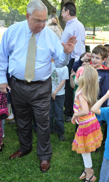Boston Mayor Thomas M. Menino reaches out to one of his younger constituents.