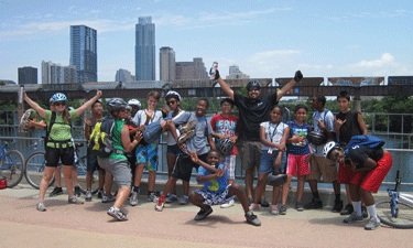 This enthusiastic group of teens is out for a bike ride along Lady Bird Lake’s Hike and Bike Trail, just one activity offered at Camacho Activity Center.
