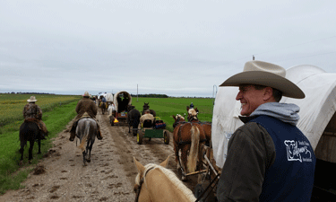 Gov. Daugaard saddles up for a ceremonial wagon ride from the territorial capital of Yankton to the state capital of Pierre, part of last year’s celebration of South Dakota’s 125th anniversary.