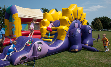  Oakland County Parks mobile units include inflatable bouncers, two climbing towers that simulate rock climbing, a zip line, stages, bleachers and retro games like sack races and kickball.